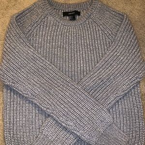 grey womans sweater